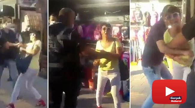 Maske takmamak için polise direnen kadına hemcinsinden görülmemiş tepki...