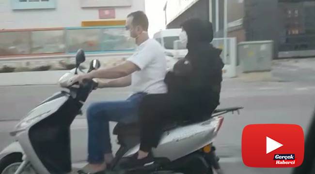 Motosiklet üzerinde bebekli çiftin tehlikeli yolculuğu