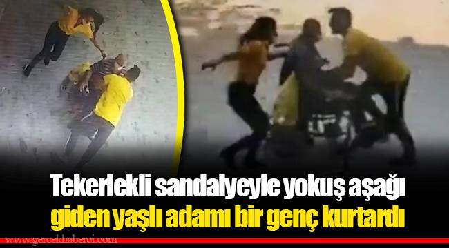 Tekerlekli sandalyeyle yokuş aşağı giden yaşlı adamı bir genç kurtardı