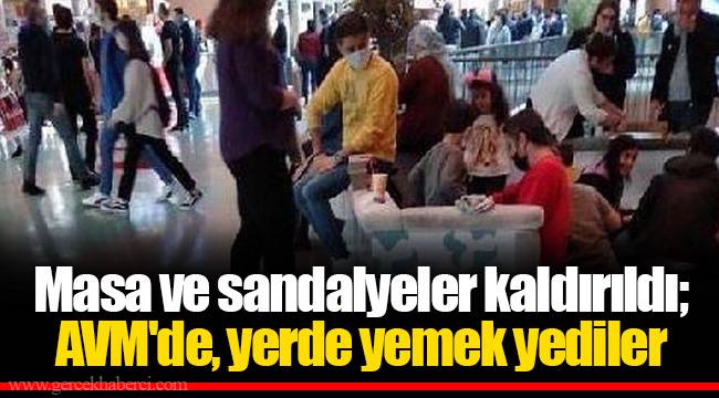 Masa ve sandalyeler kaldırıldı; AVM'de, yerde yemek yediler