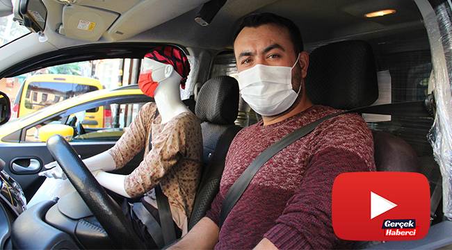 Taksiciden korona virüse cansız mankenli önlem