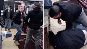 Irkçının yüzüne teneke kutuyla vurduğu anlar viral oldu: