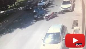 Motosikletlinin metrelerce sürüklendiği kaza kamerada