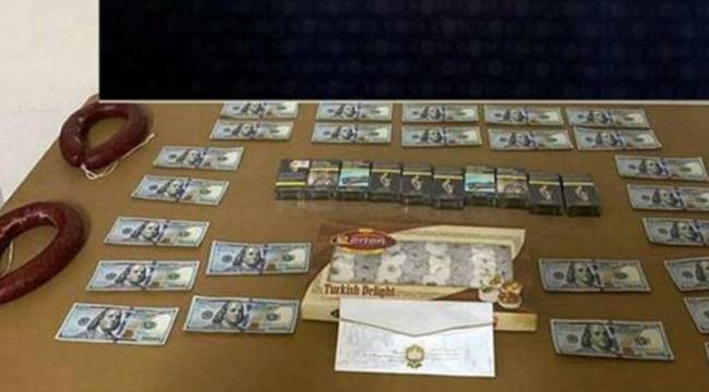 Rüşvet olarak 2 kangal sucuk, bir paket lokum ve 2500 dolar isteyen memur suç üstü yakalandı!