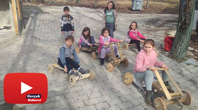 Çocuklar tahta araçlarla kıyasıya yarıştı