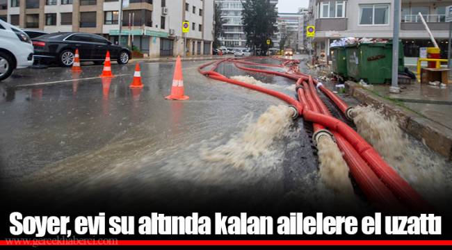 Soyer, evi su altında kalan ailelere el uzattı 