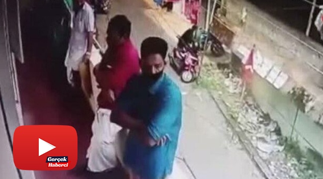 Bayılan adam son anda balkondan düşmekten kurtarıldı