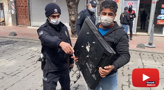 Kucağında çalıntı televizyonla denetimde polise yakalandı