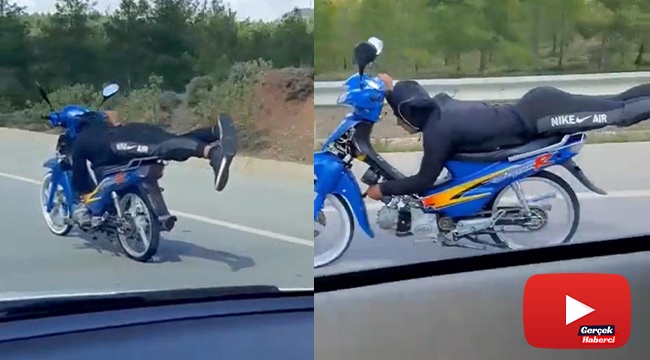Yatarak tek elle motosiklet kullandı