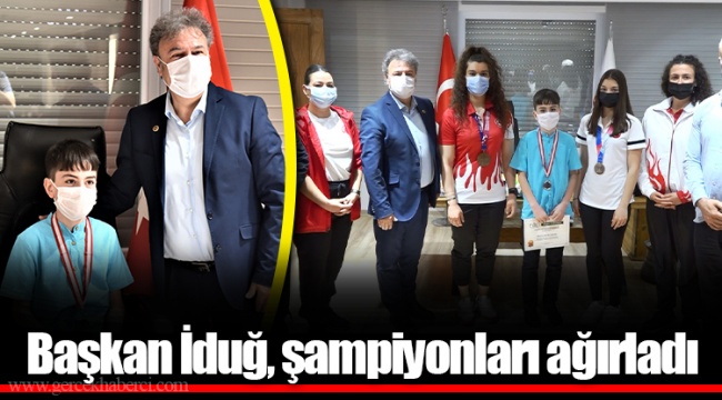 Başkan İduğ, şampiyonları ağırladı