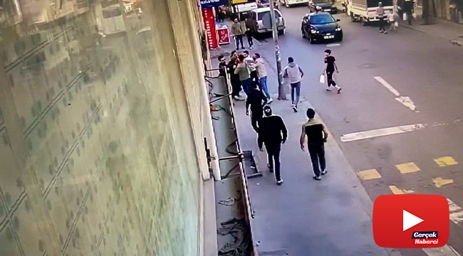 Sokak ortasında tekmeli sopalı kavga kamerada