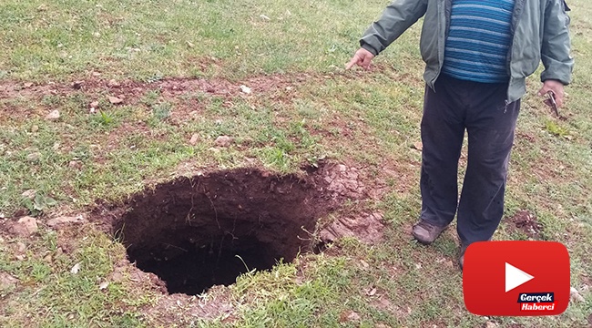 Tarlada oluşan 10 metrelik çukur vatandaşları tedirgin etti