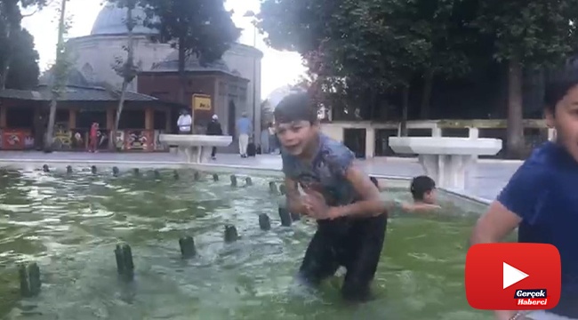 Çocukların süs havuzunda tehlikeli eğlencesi kamerada