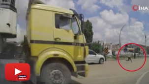 Tırın altında kalmaktan kıl payı kurtuldu