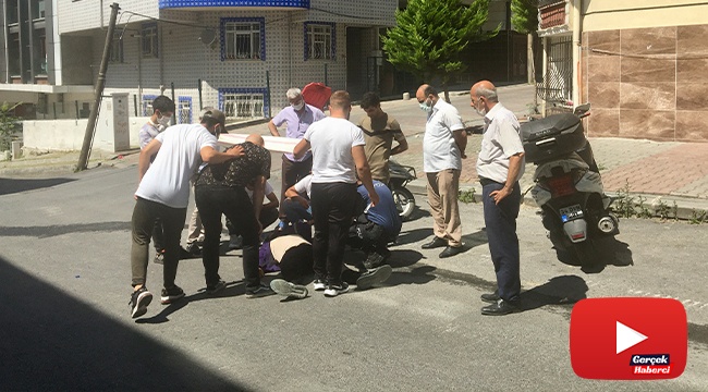Yaralı kuryeyi güneşten korumak için çuvalla gölge yaptılar