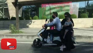 Motosiklet üzerinde 4 kişilik tehlikeli yolculuk