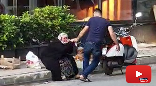 Silahlı saldırganın sokak ortasında annesini darp ettiği anlar kamerada
