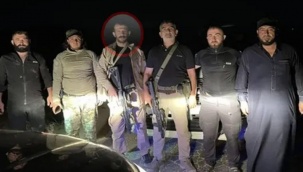 Suriye'de silahla poz veren MHP'li ilçe başkanı görevinden istifa etti