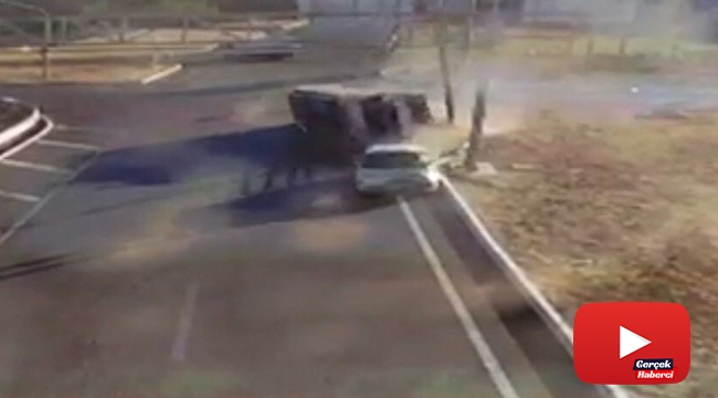 Kamyon ile otomobilin çarpışma anı güvenlik kamerasına yansıdı