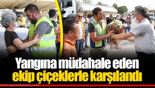 Yangına müdahale eden ekip çiçeklerle karşılandı