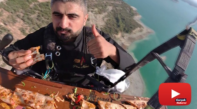 Yamaç paraşütünde metrelik 'piton döner' ziyafeti