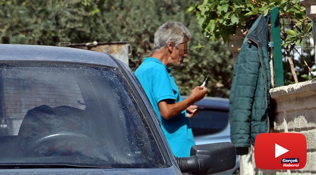 Elinde şırıngayla ayakta durmakta zorlandı, polis tarafından uzaklaştırıldı