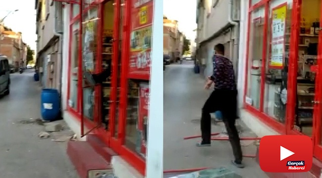 Markete kilitlenen hırsız camı kırarak böyle kaçtı