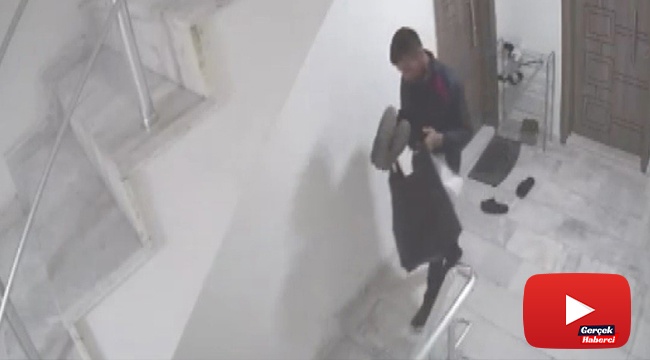 Beğendiği ayakkabıları seçip çaldı