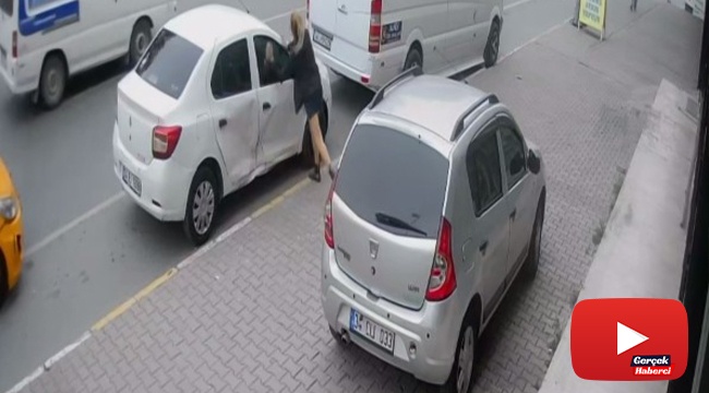 Eşiyle tartıştı, öfkesini arabasından çıkardı: O anlar güvenlik kamerasında