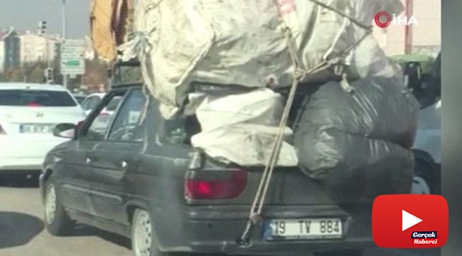 Otomobiline adeta kamyon gibi yük yükledi