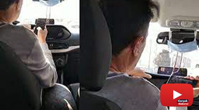 Seyir halinde at yarışı izleyen taksiciye cezai işlem uygulandı