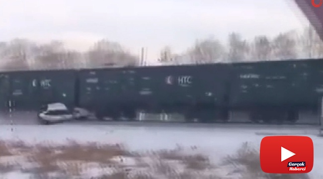 yük treni altına aldığı aracı metrelerce sürükledi