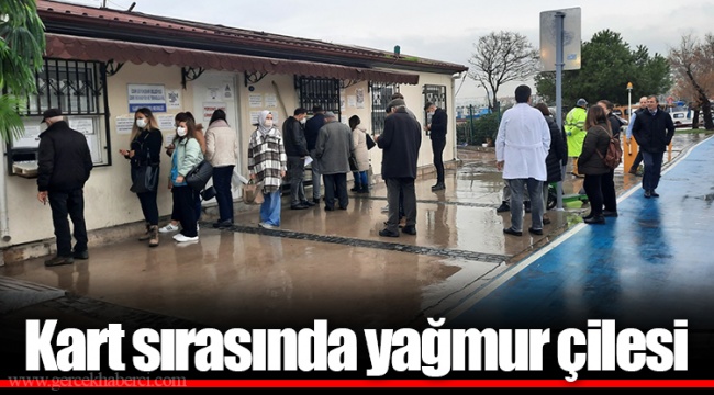 Kart sırasında yağmur çilesi