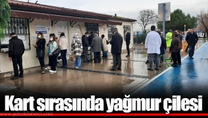 Kart sırasında yağmur çilesi