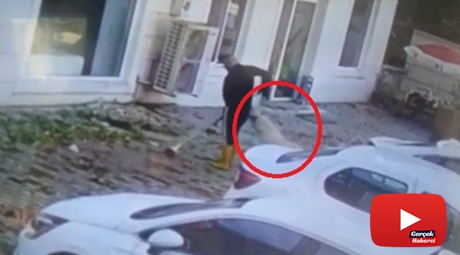 Kaldırımı temizlerken köpeğin saldırısına uğradı