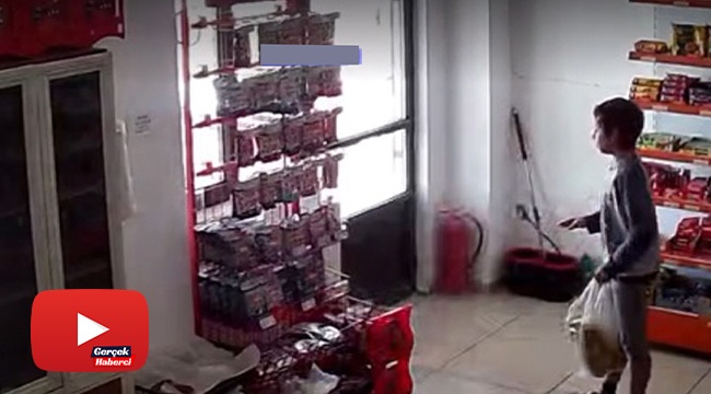 Köpek saldırısından son anda kaçan çocuğun korku dolu anları güvenlik kamerasına yansıdı