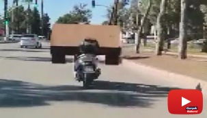 Motosiklet ile masa taşıdı