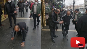 Sürünme numarasıyla dilenen şahıs zabıtadan kaçamadı