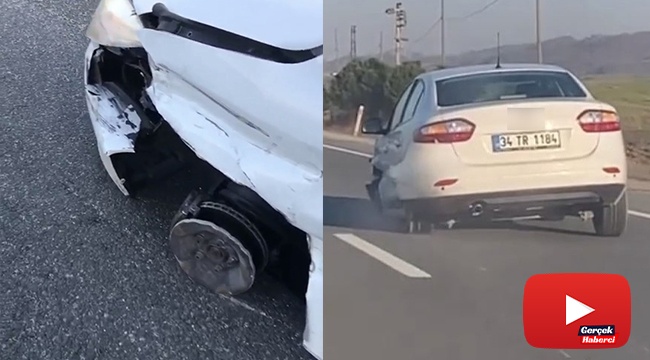 Parçalanmış lastikleri ve yerdeki tampon ile yoluna devam etti