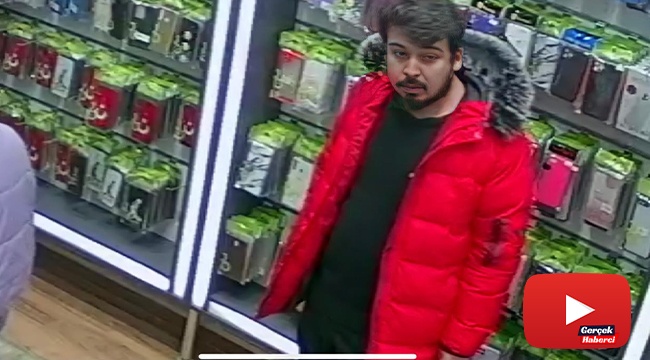 'Kırmızı montlu dolandırıcı' telefoncu esnafının kâbusu oldu