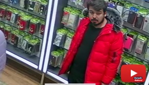 'Kırmızı montlu dolandırıcı' telefoncu esnafının kâbusu oldu