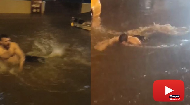 Yollar göle döndü, bir vatandaş araçlar arasında yüzdü