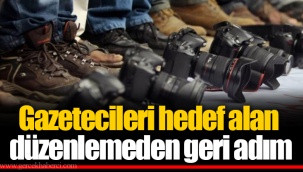 Gazetecileri hedef alan düzenlemeden geri adım