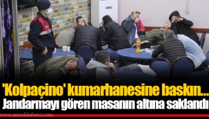 'Kolpaçino' kumarhanesine baskın...Jandarmayı gören masanın altına saklandı