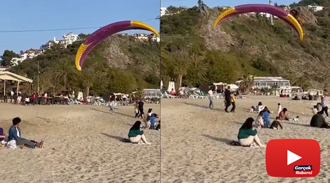 Sahile inen yamaç paraşütçüsünün çarptığı kadın yaralandı