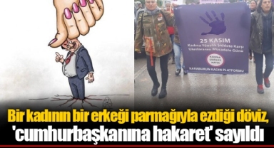Bir kadının bir erkeği parmağıyla ezdiği döviz, 'cumhurbaşkanına hakaret' sayıldı
