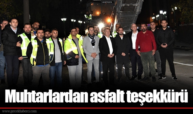 Muhtarlardan asfalt teşekkürü