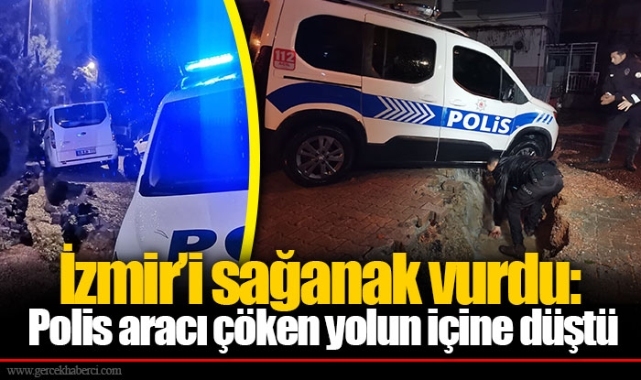 İzmir’i sağanak vurdu: Polis aracı çöken yolun içine düştü