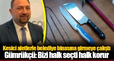 Kesici aletlerle belediye binasına girmeye çalıştı