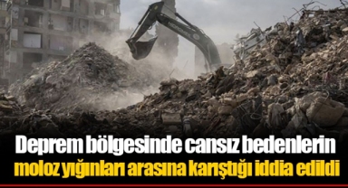Deprem bölgesinde cansız bedenlerin moloz yığınları arasına karıştığı iddia edildi
